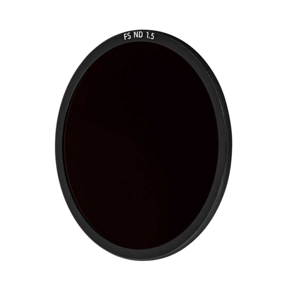 Front view of a circular black ND filter with "FS ND 1.5" text visible on the rim, displaying the dark optical glass element.