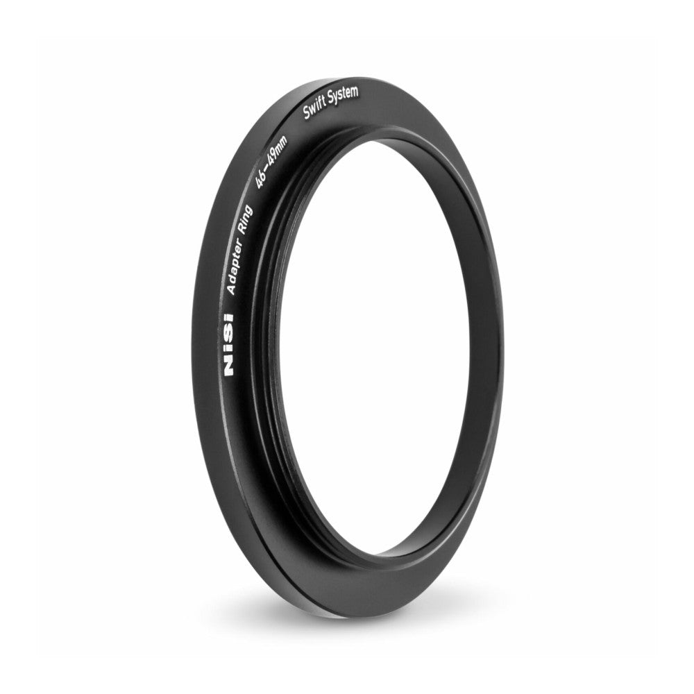 Black circular adapter ring shown at an angle, displaying engraved text indicating 49-49mm size and Swift System branding on the outer edge.