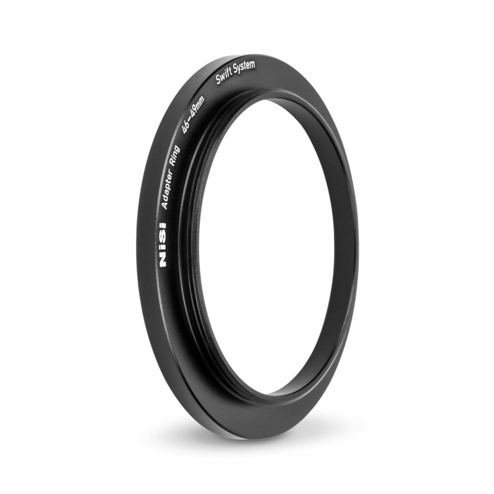 Black circular adapter ring shown at an angle, displaying engraved text "NiSi," "Adapter Ring," "46-49mm," and "Swift System" on its surface.