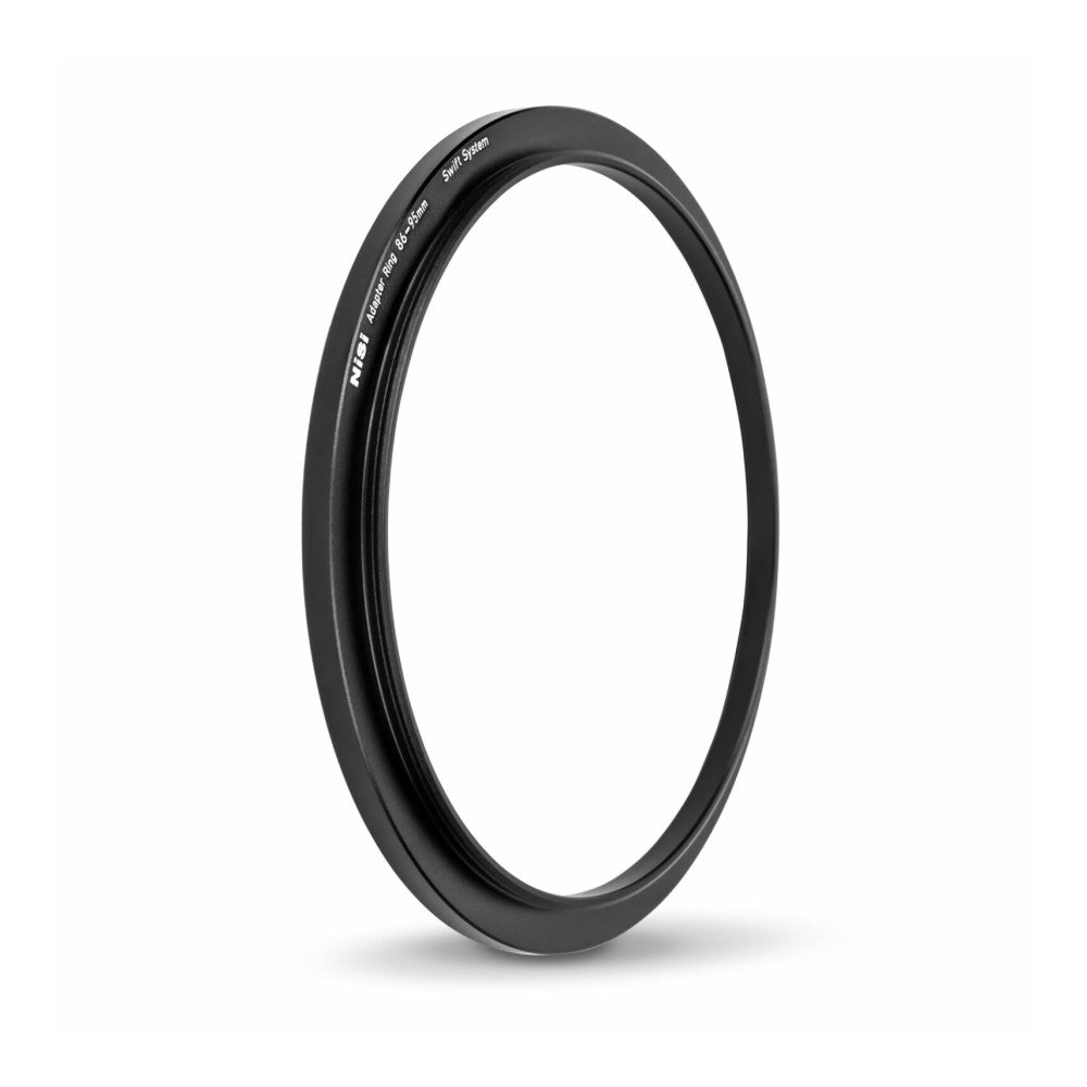 Black circular adapter ring photographed at a slight angle against a white background, showing the engraved text on the outer edge.