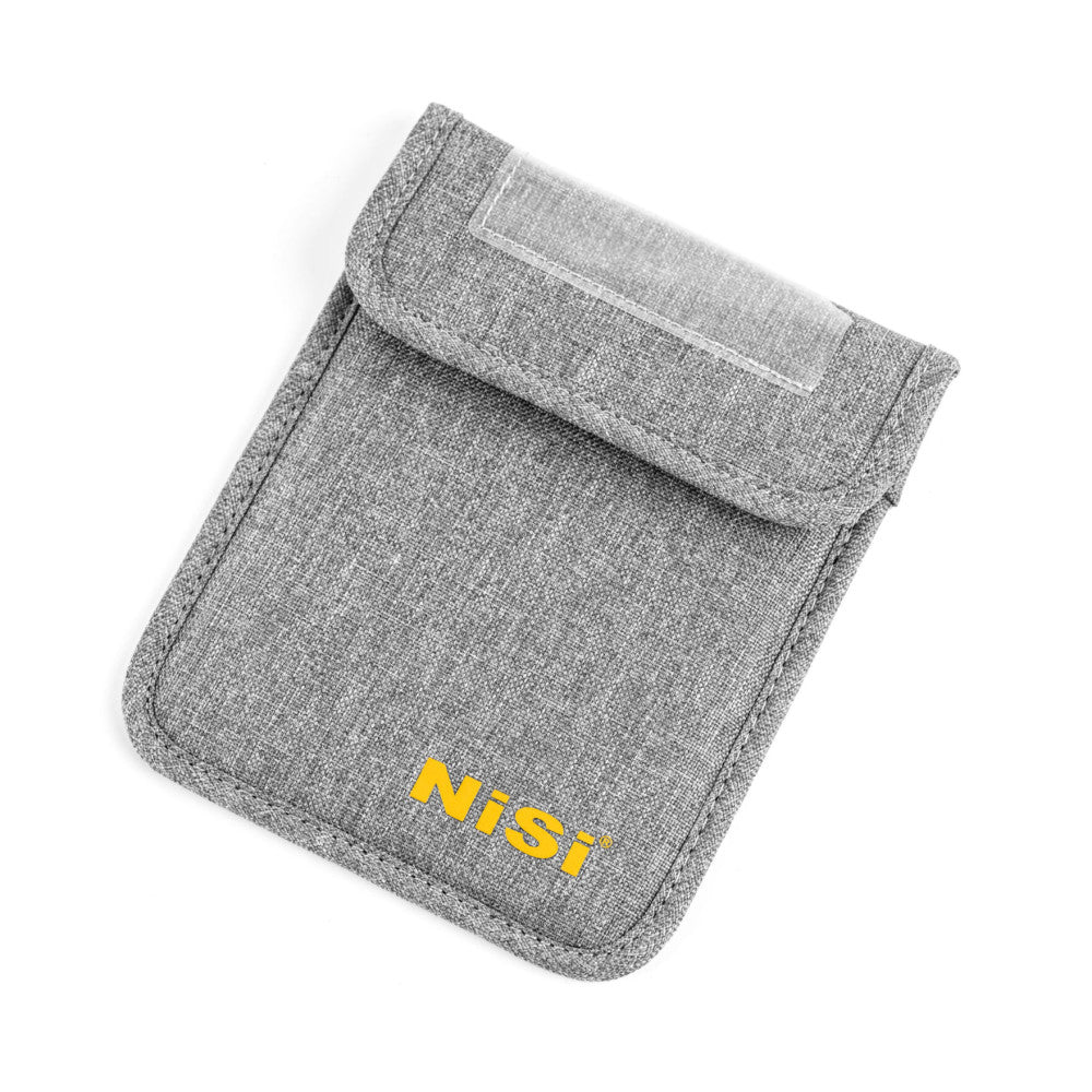 Gray fabric filter storage bag with yellow NiSi branding, shown at an angle with flap detail visible against white background.