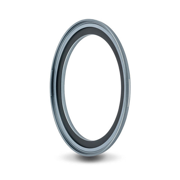 Angled side view of a metallic circular magnetic adapter ring with grooved texture, photographed against a white background.