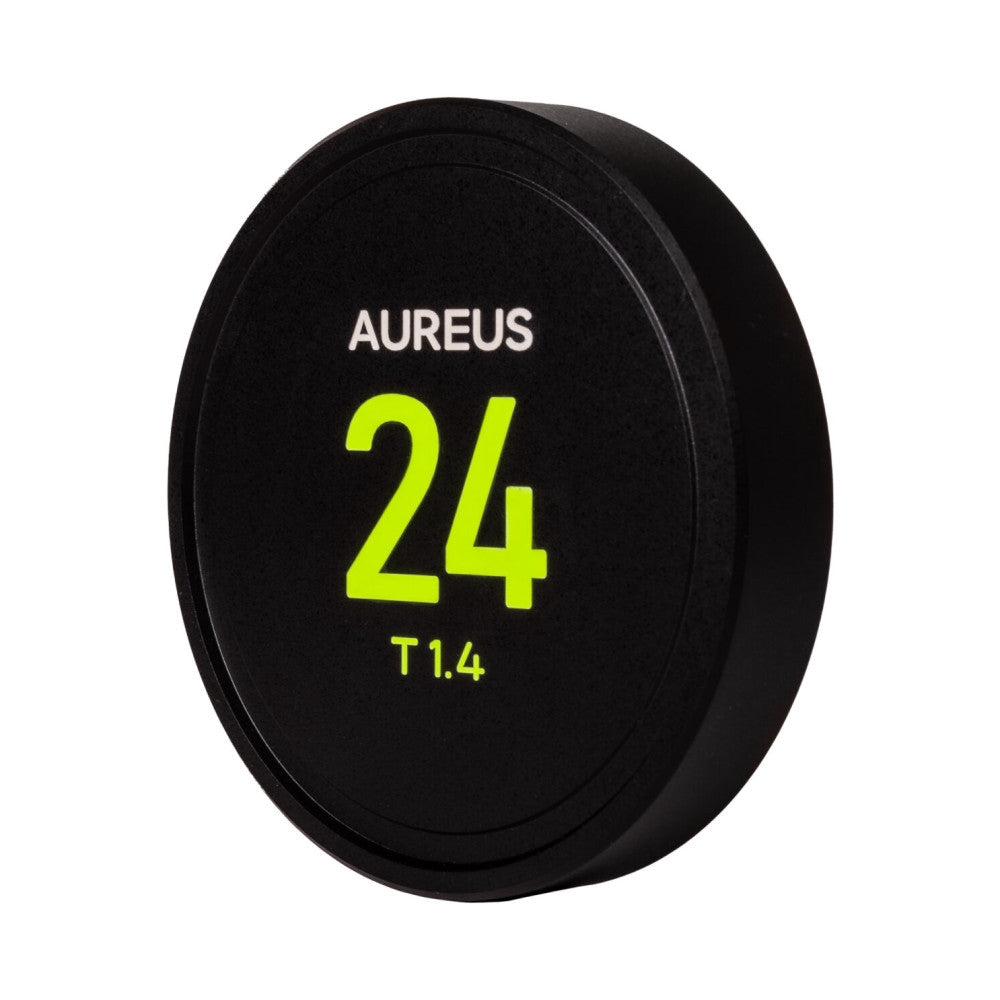 Black circular lens cap with white "AUREUS" text and bright yellow "24" and "T1.4" specifications displayed on front surface, angled view.