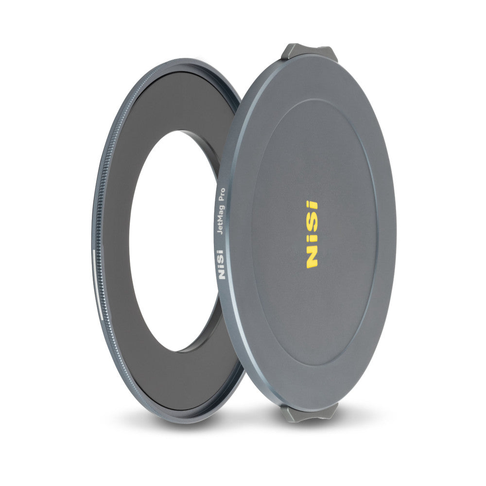 NiSi JetMag Pro magnetic adapter ring and lens cap shown open at an angle, displaying the filter ring and protective cover with yellow branding.