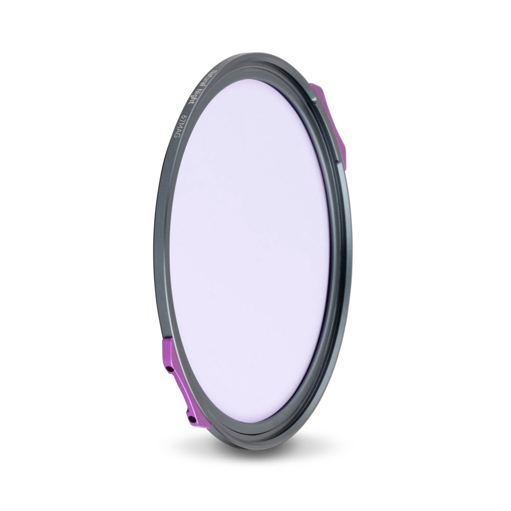 NiSi JetMag Pro 67mm magnetic filter shown at an angle, displaying the gray metal ring with purple magnetic attachment points and light purple-tinted glass surface.