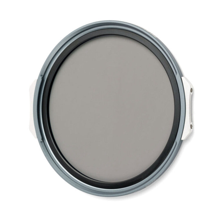 Front view of a circular gray magnetic filter with dark inner ring and white attachment tab visible on the side against white background.