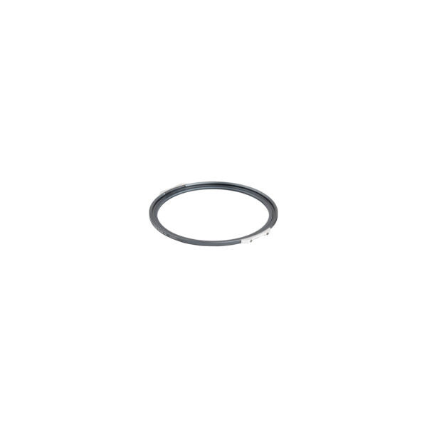 Top-down view of a circular gray magnetic filter ring with a small white attachment point visible on the rim.