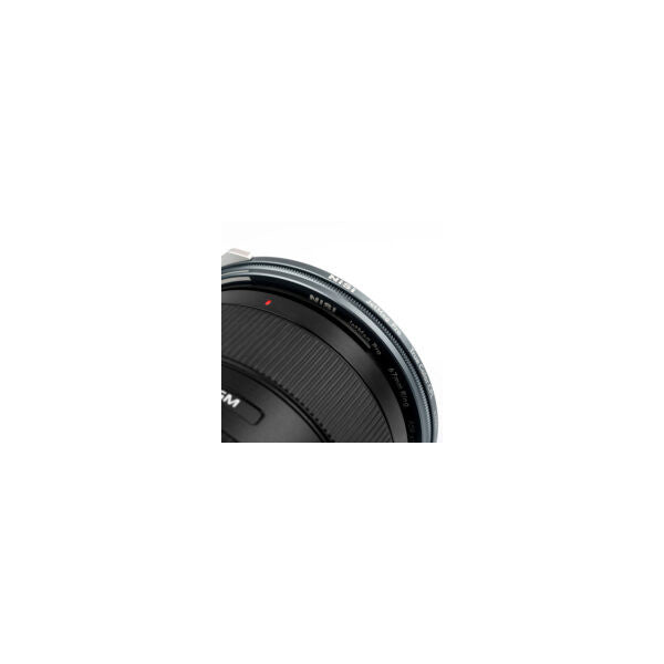 Close-up detail of NiSi JetMag Pro magnetic adapter ring showing the ribbed surface and metallic edge against a blurred lens background.