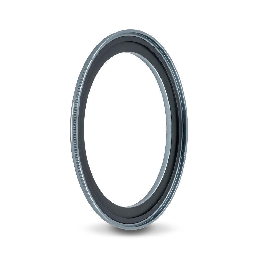 Gray magnetic adapter ring shown at a tilted angle against white background, displaying the inner metal surface and outer ribbed edge detail.