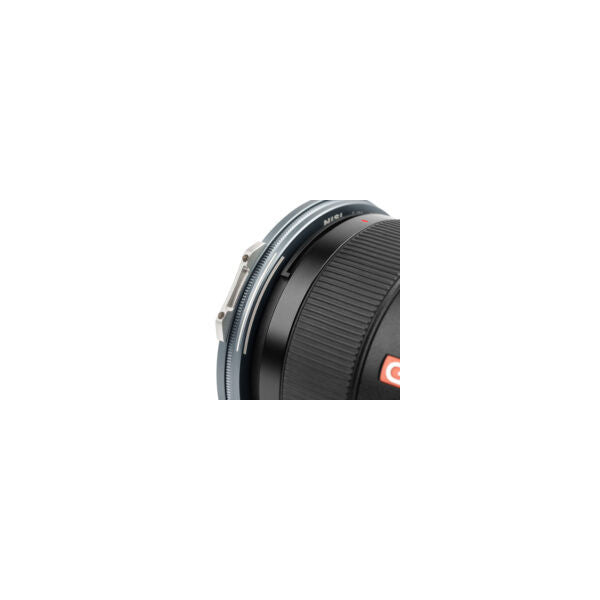 Close-up of NiSi JetMag Pro 67mm magnetic adapter ring attached to camera lens, showing front and side detail of the black ring component.