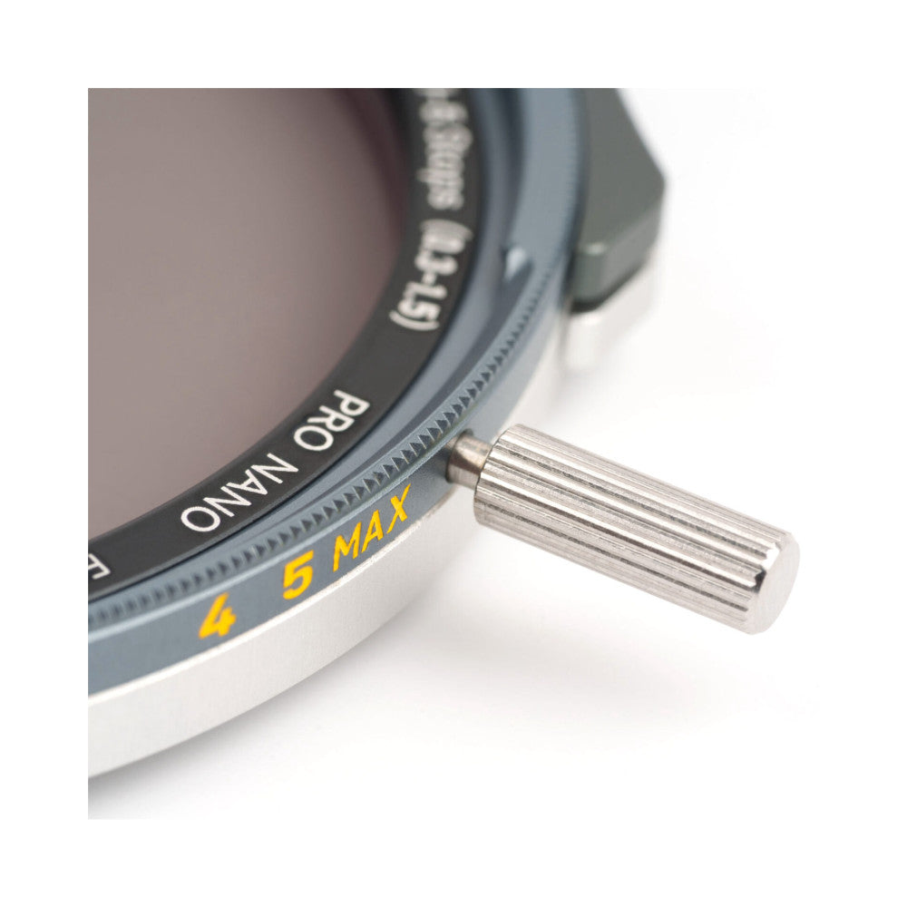 Close-up detail of magnetic filter ring showing yellow "4-5 MAX" marking and metal connector pin against white background.
