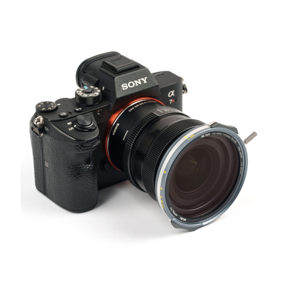 Sony a7R camera with wide-angle lens and magnetic filter ring attached, shown at three-quarter angle against white background.