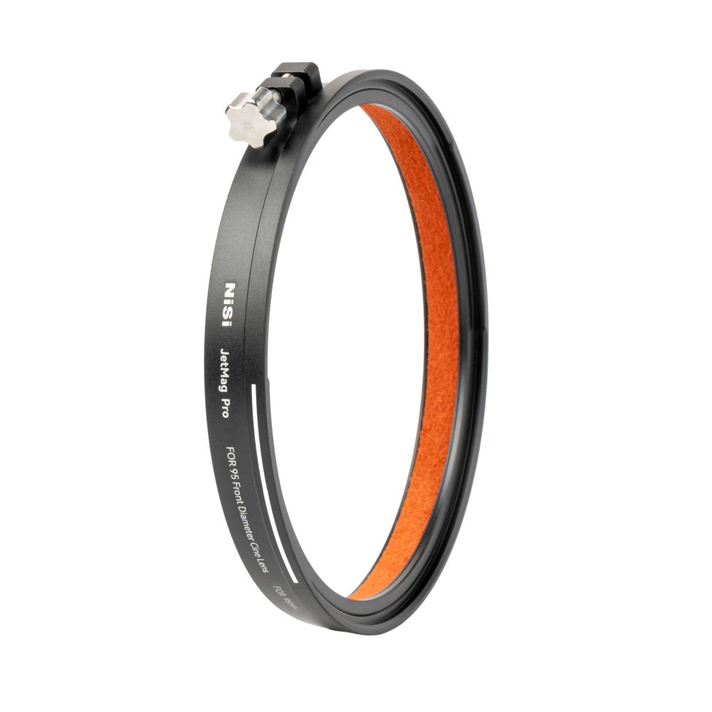 Black circular adapter ring with orange interior lining, shown at an angle with clamp mechanism visible at top.