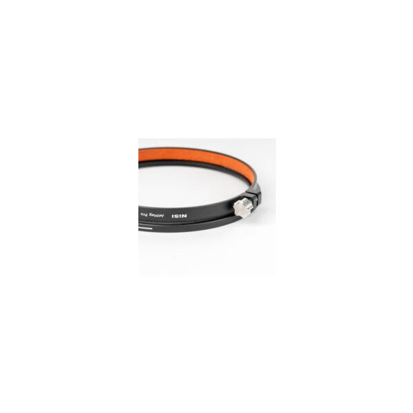 Close-up detail view of NiSi JetMag Pro adapter ring showing black and orange band with clamp mechanism and product branding.