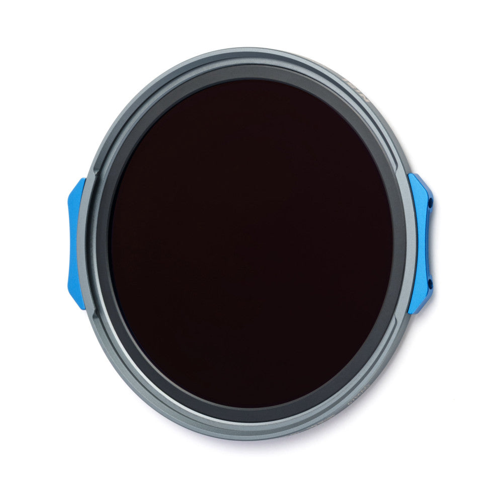 Top-down view of a circular gray and blue magnetic ND filter with a dark glass center and blue side handles against a white background.