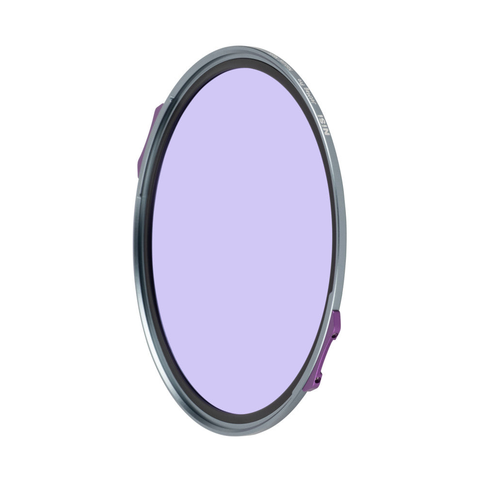Oval-shaped magnetic filter with purple tint glass and gray metal frame with purple mounting clips, shown at an angle against white background.