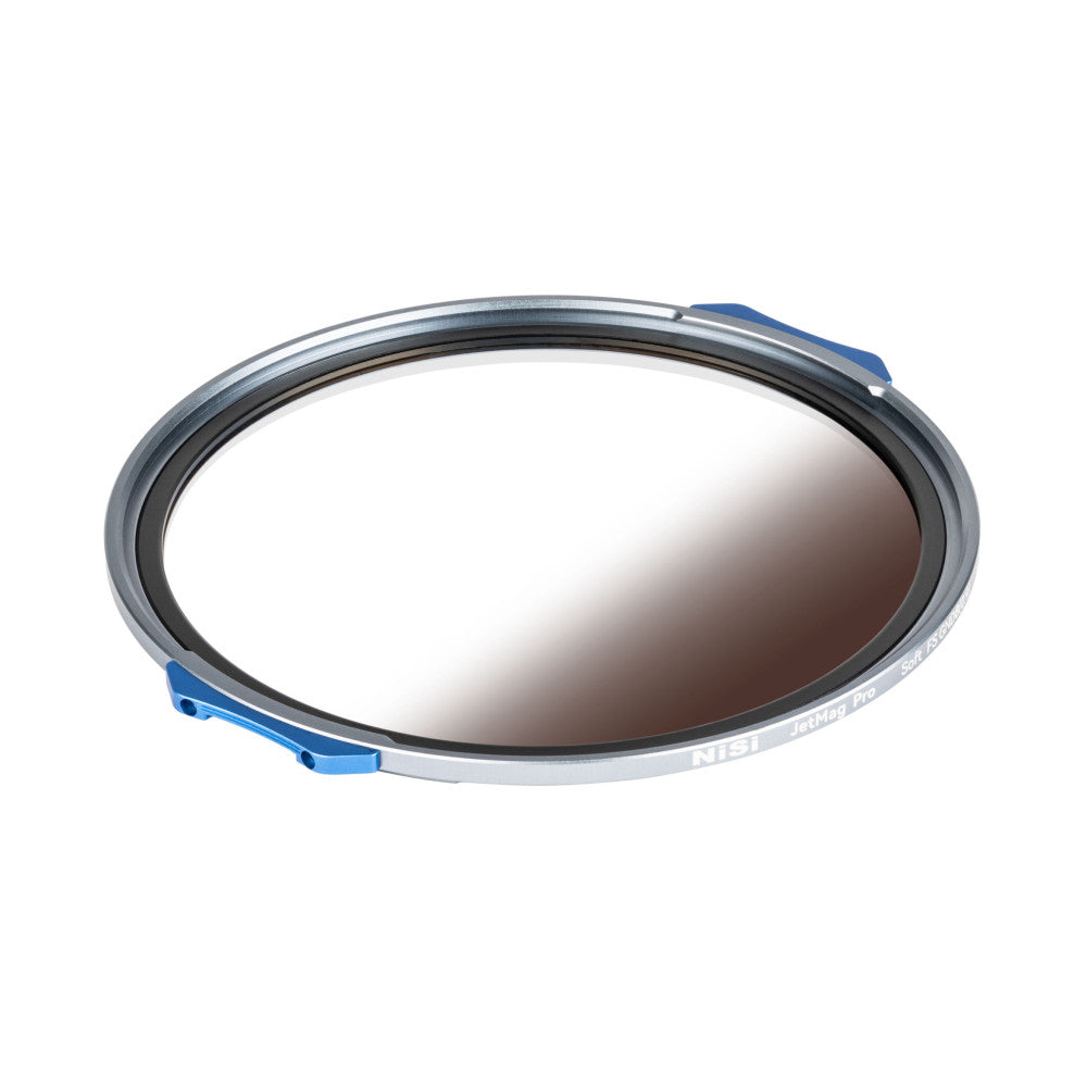 Angled view of a circular magnetic filter with blue and white clamps, showing the graduated gray-to-clear glass element with a soft vignette effect.