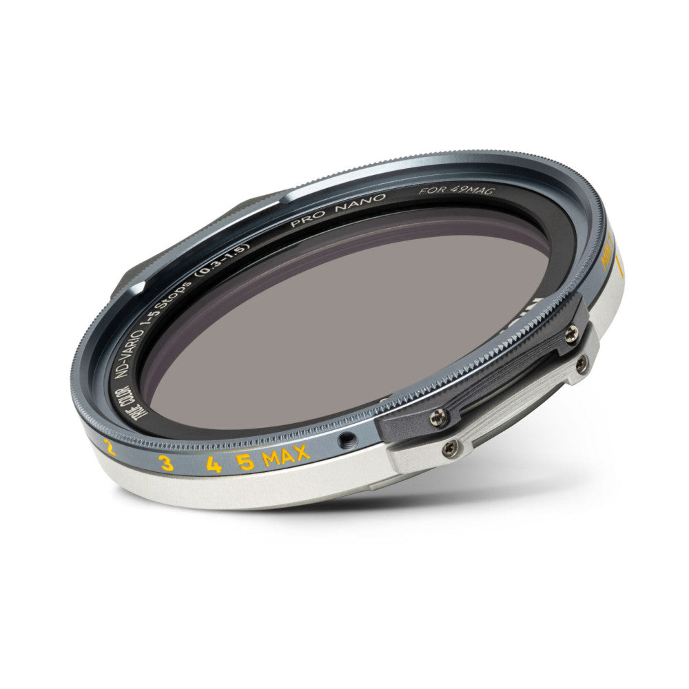 Side angled view of a circular magnetic ND filter with graduated density scale markings and "PRO NANO" branding visible on the dark metal ring.