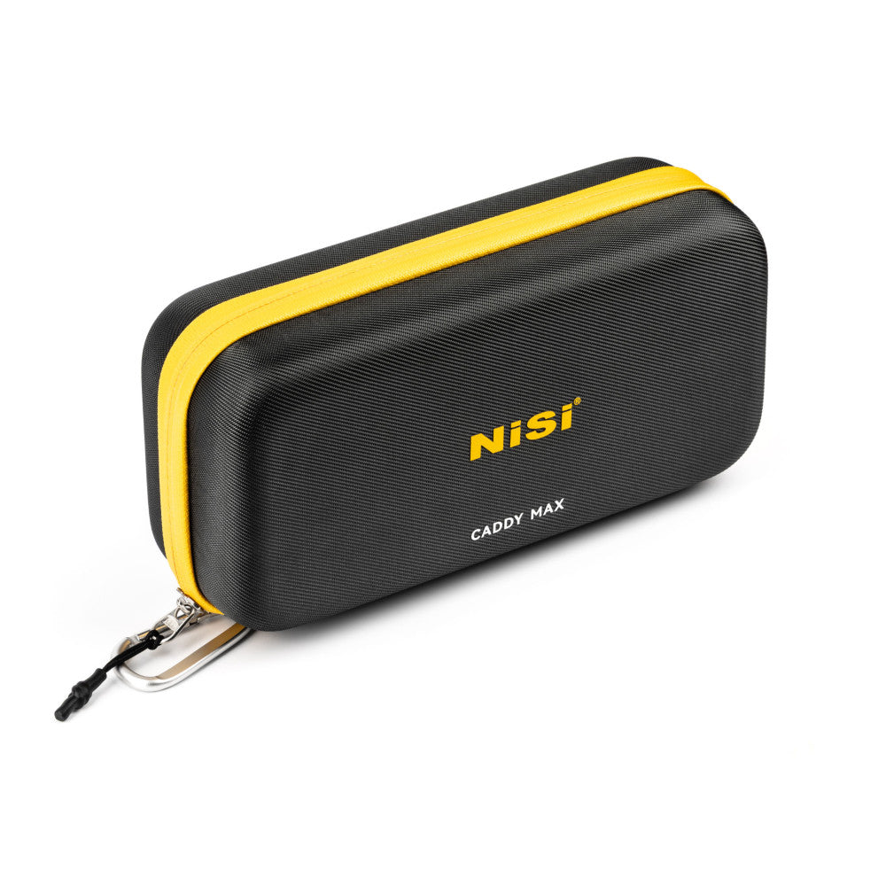 Black and yellow NiSi Caddy MAX filter pouch shown at an angled side view, displaying the zippered opening and carrying strap against a white background.