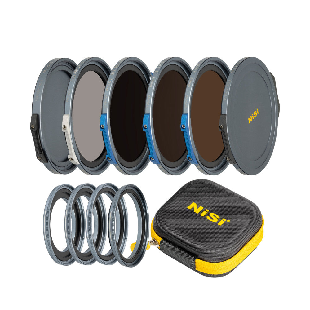 NiSi JetMag Pro filter kit displayed with six magnetic filters fanned out, four adapter rings, and a black and yellow carrying case.
