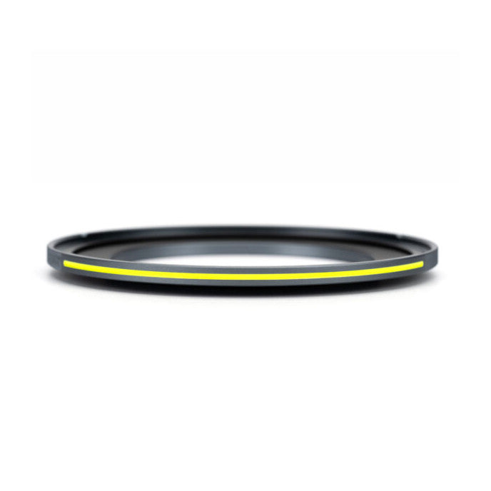 Side view of a black circular magnetic adapter ring with a yellow luminous stripe, displayed against a white background.