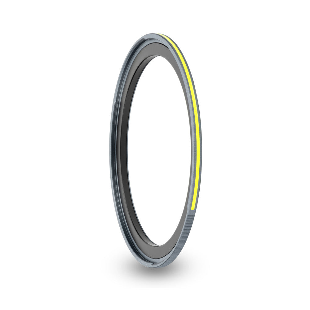 Angled side view of a gray magnetic adapter ring with a yellow luminous stripe, displayed against a white background.