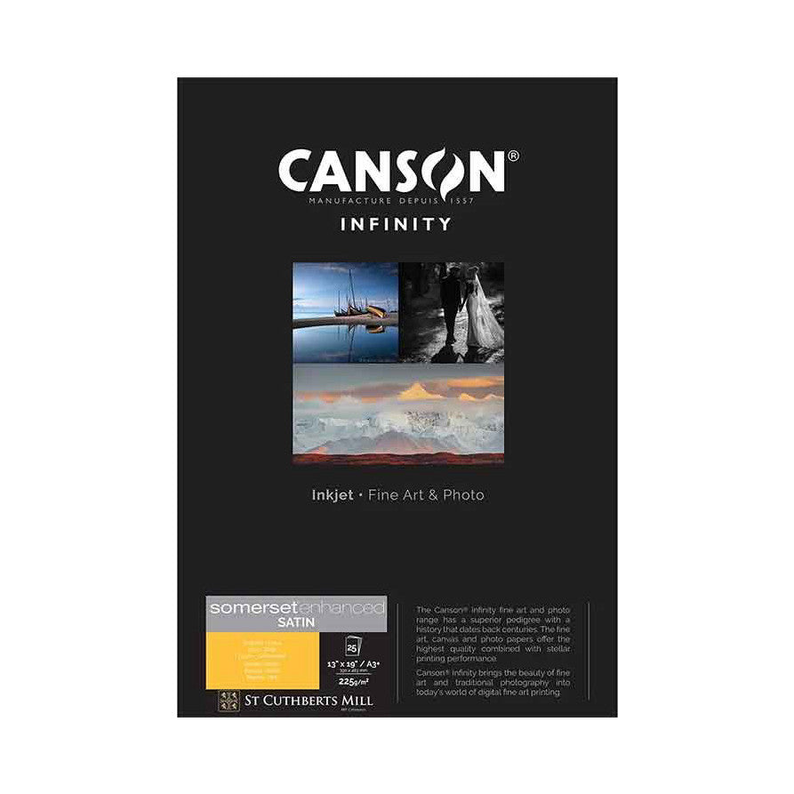 Front of Canson Infinity product box displaying brand logo, paper specifications, sample photographs, and Somerset Enhanced Satin paper details on black background.