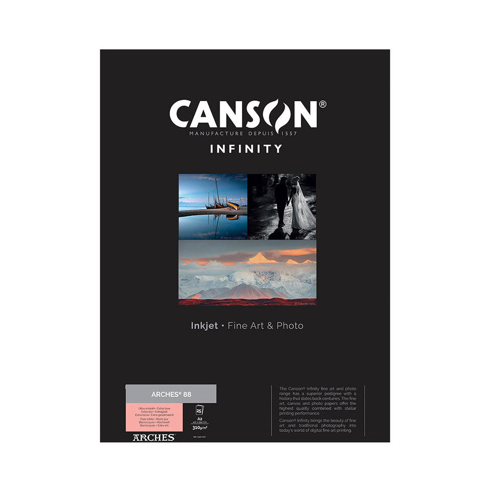 Front of Canson Infinity product packaging box showing fine art photography samples and Arches 88 paper specifications on black background.