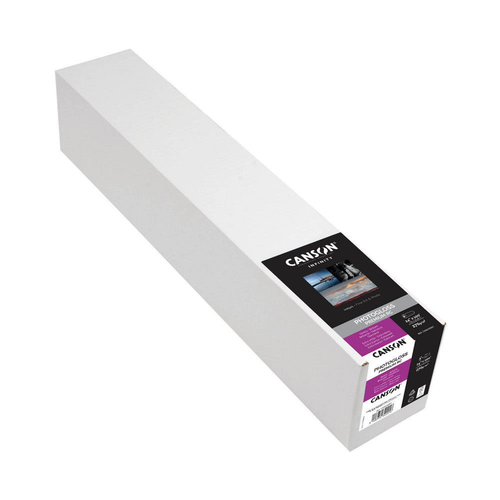 Long white roll of photo paper with black and purple product label on the end, shown at an angle against white background.