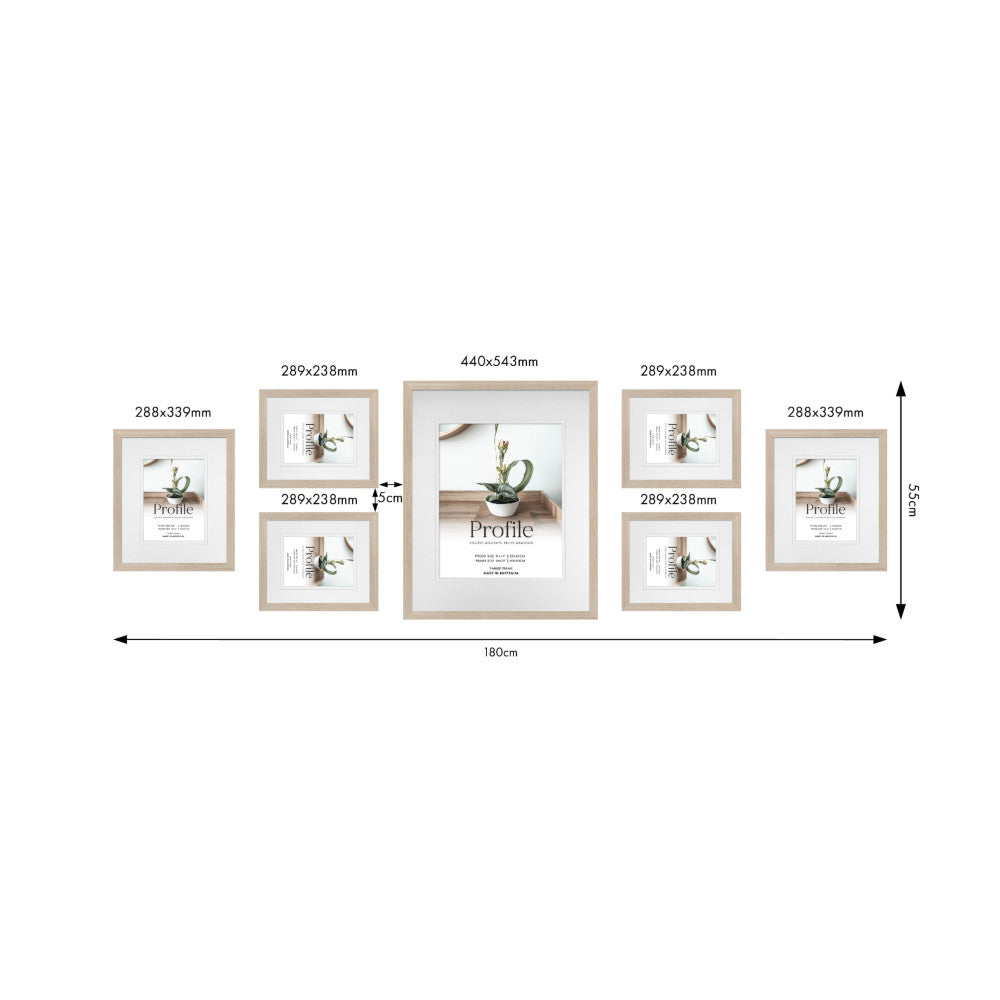 Dimensional diagram showing frame sizes and spacing for a 7-piece gallery wall arrangement with measurements in millimeters and centimeters.