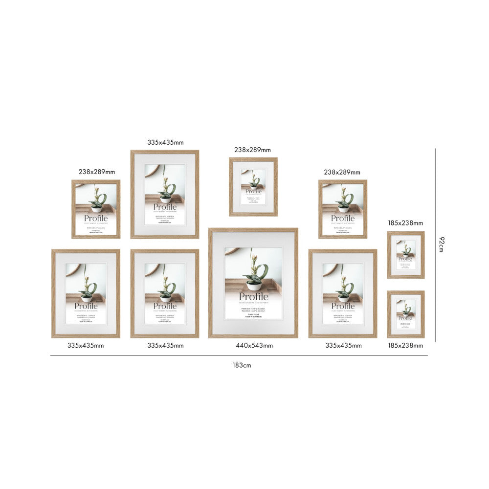 Ten wooden picture frames in various sizes arranged in a gallery wall layout, displaying dimensions in millimeters and total width measurement.