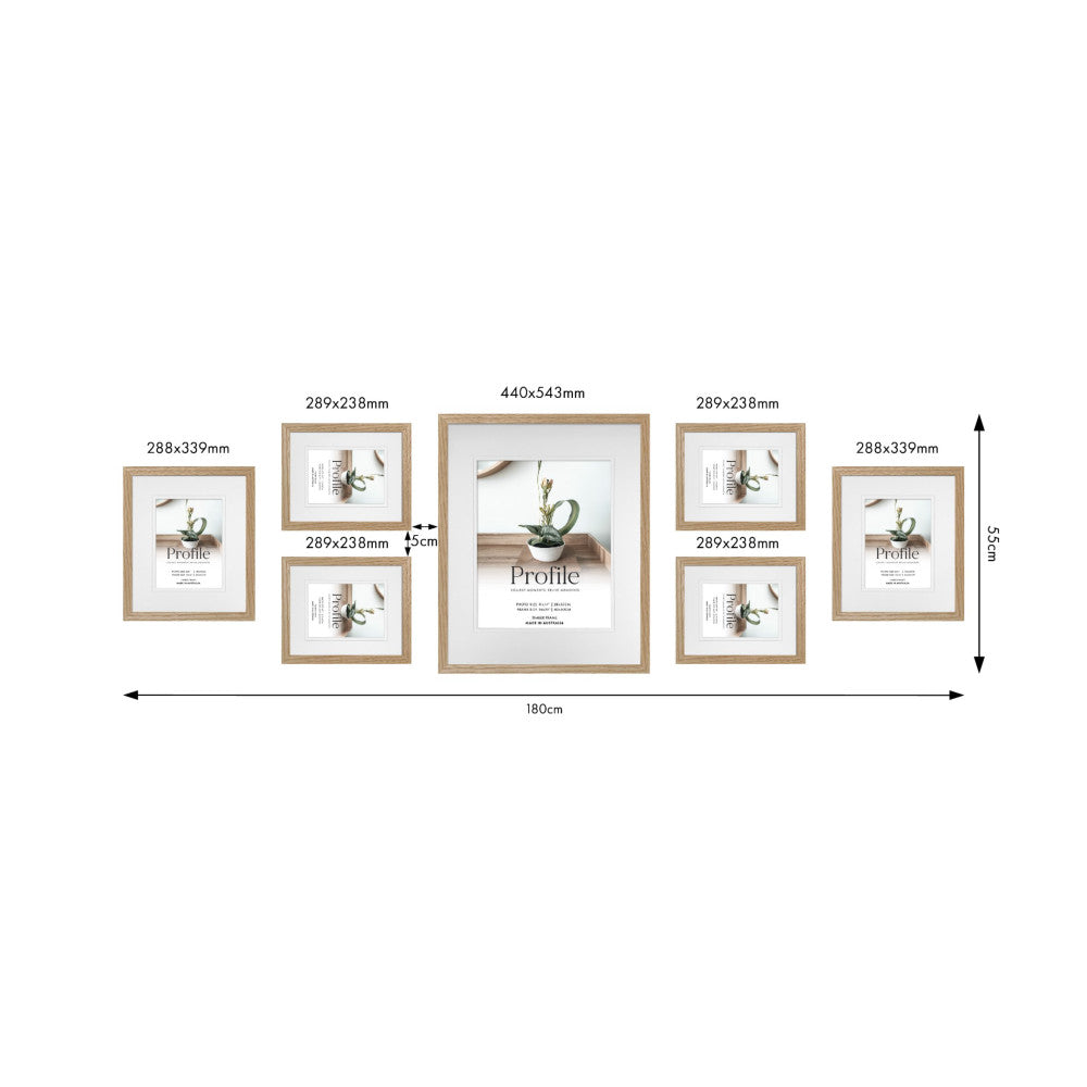 Overhead diagram showing seven wooden frames arranged in a gallery wall layout with labeled dimensions in millimeters and centimeters.