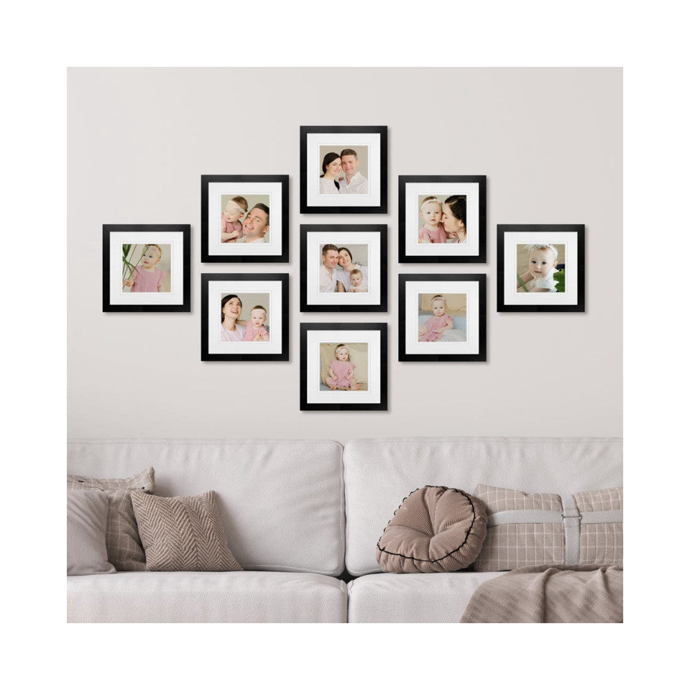 Nine black gallery frames arranged in a diamond pattern on a wall above a beige sofa, displaying family photos.