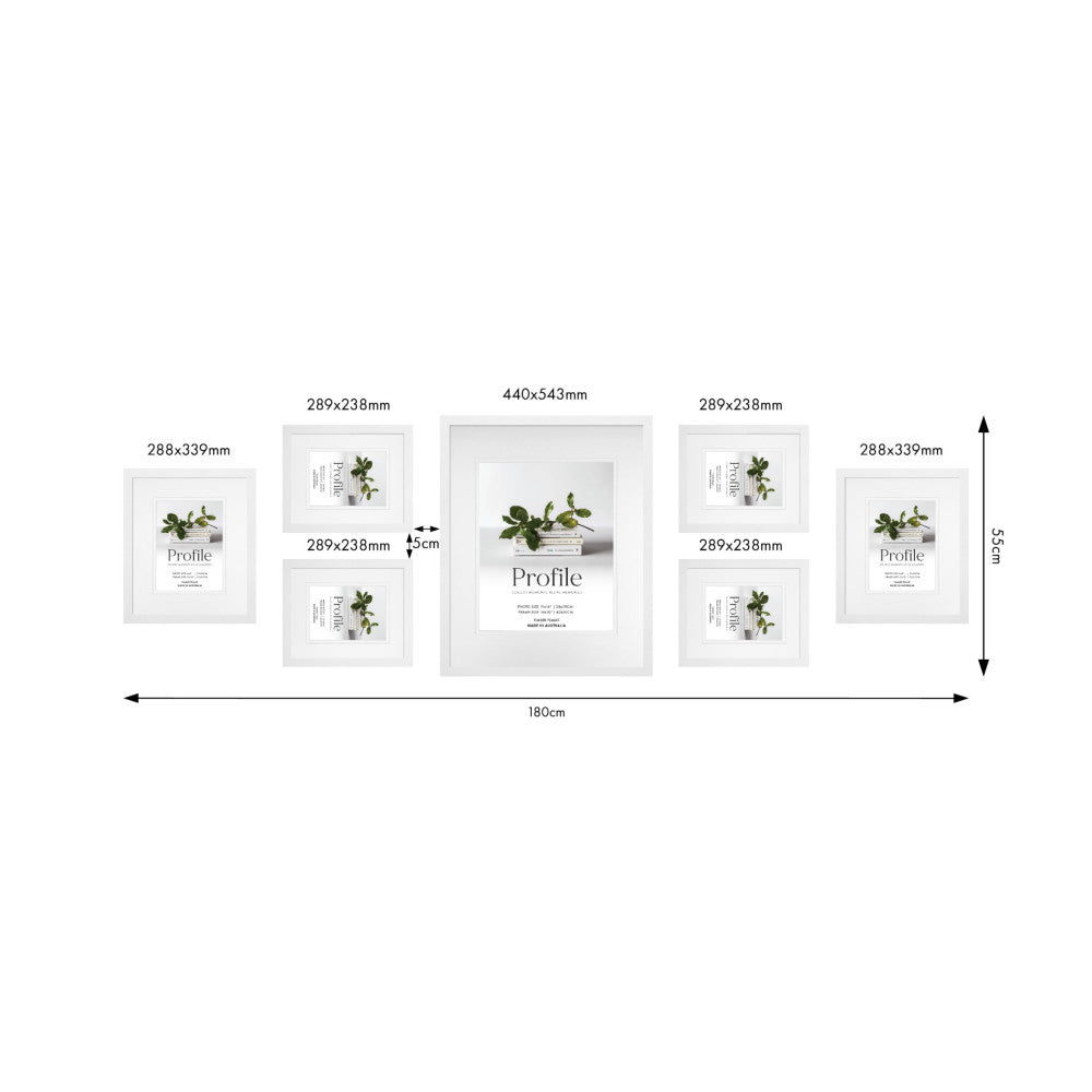Overhead diagram showing 7 white frames arranged in a gallery wall layout with dimensions and spacing measurements labeled.