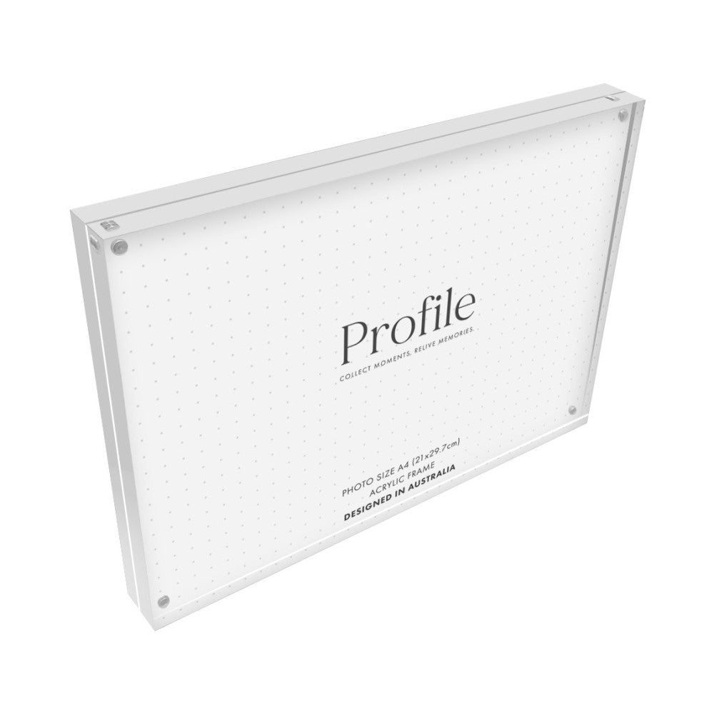 Angled perspective view of a clear acrylic photo block frame with white speckled design and metal corner fasteners.