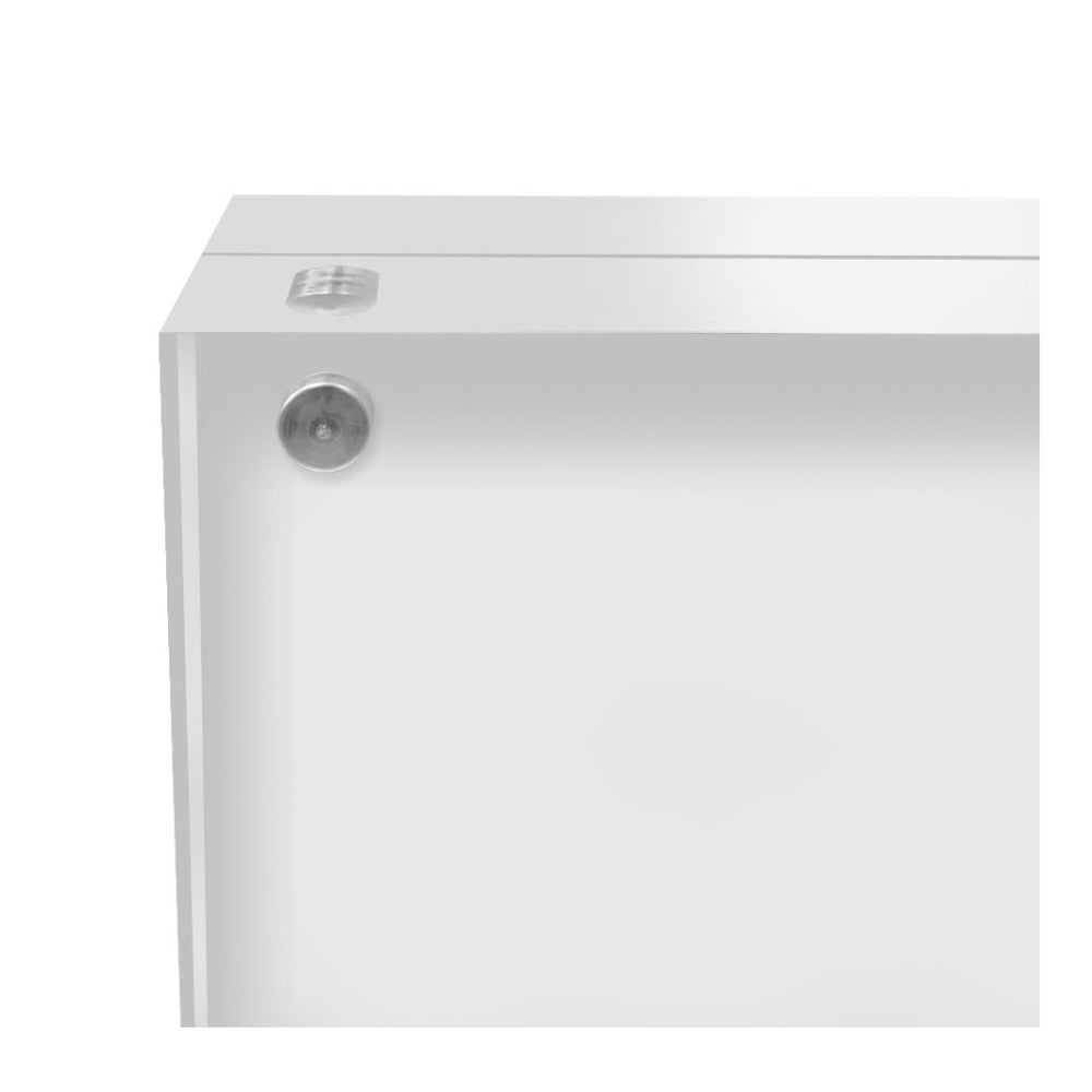 Close-up detail view of a clear acrylic photo block showing mounting hardware and corner edge construction against white background.