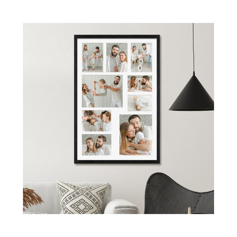 Black framed photo collage displaying nine family photos mounted on a white wall above a chair and decorative pillow.