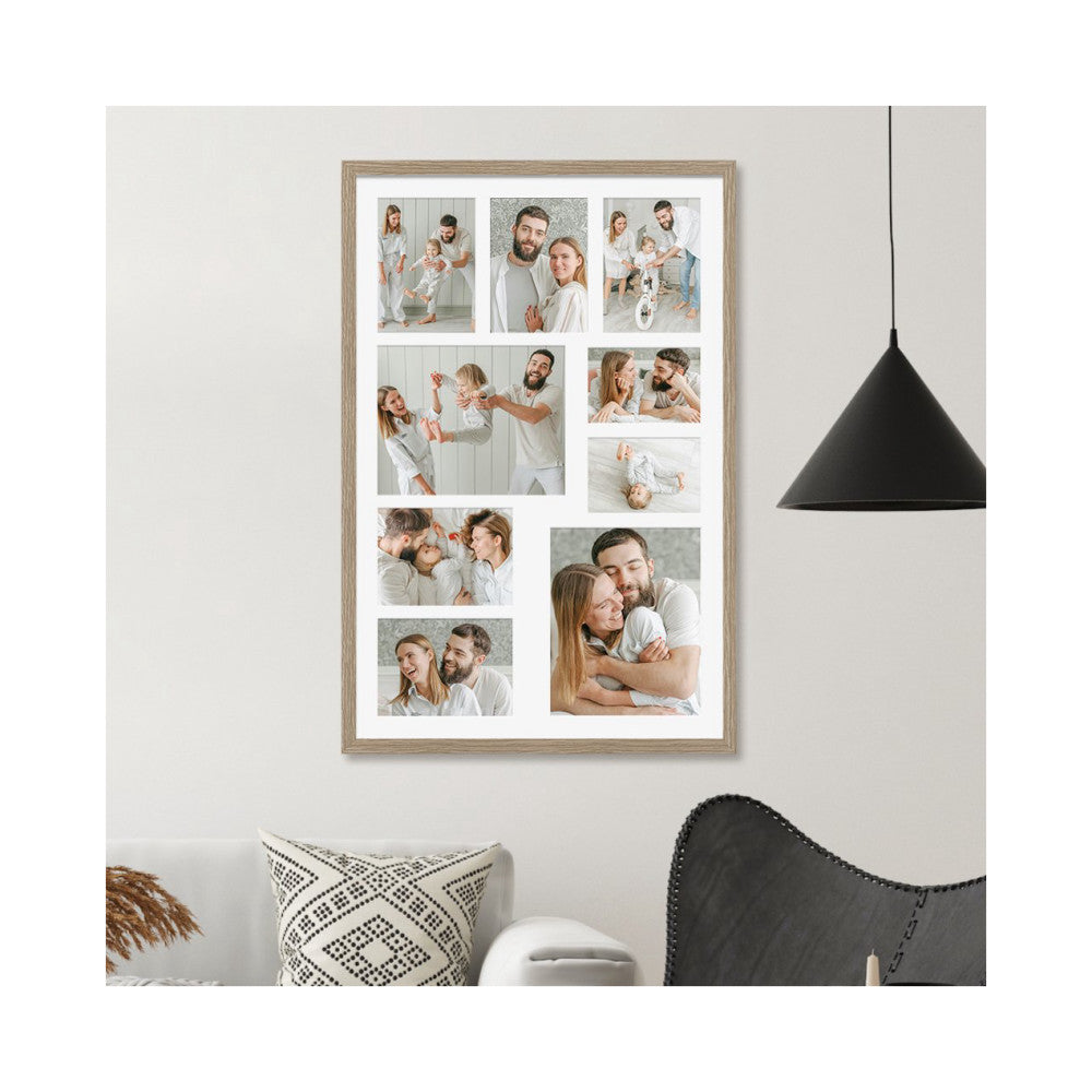 Framed multi-photo collage displaying nine family portraits in a natural wood frame, hung on a white wall above furniture.