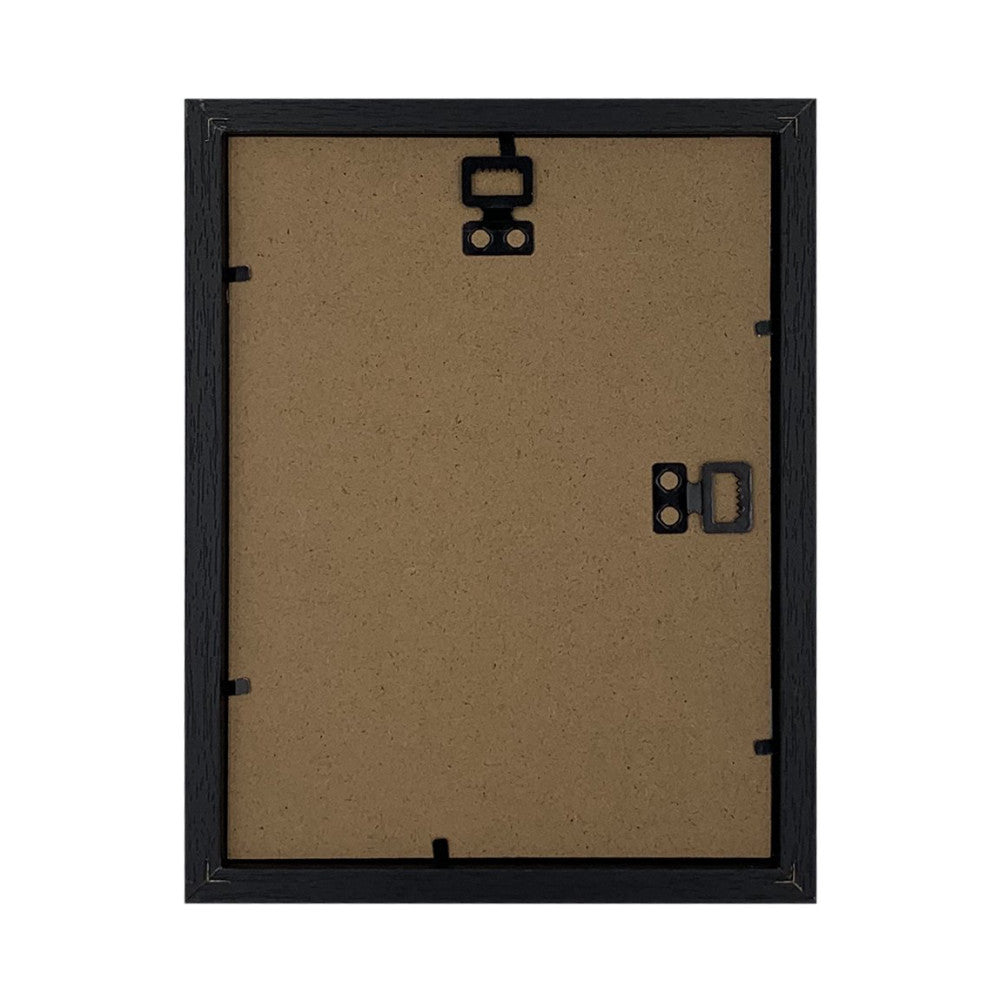 Rear view of a black wooden picture frame showing cork backing, hanging hardware, and metal corner tabs.