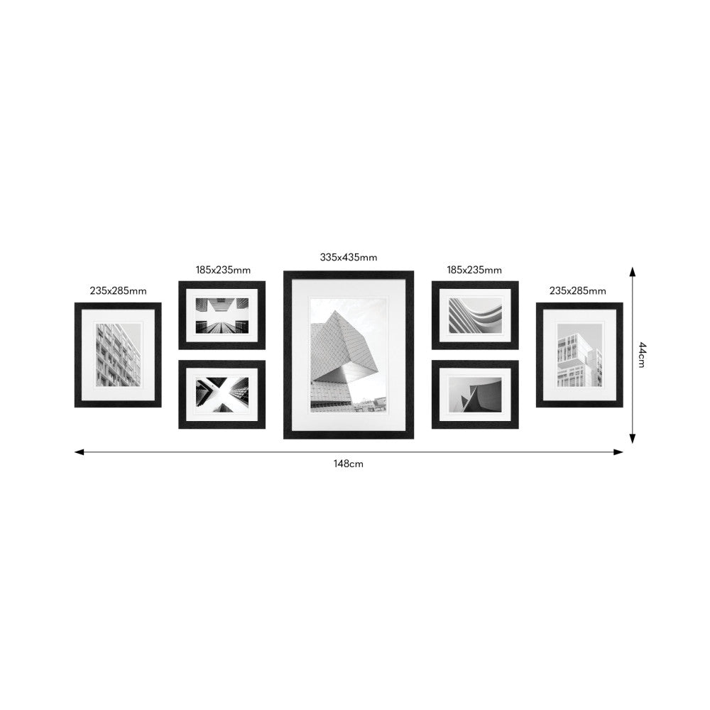 Seven black frames of varying sizes arranged in a gallery wall layout with dimensions labeled, shown as a flat overhead schematic diagram.