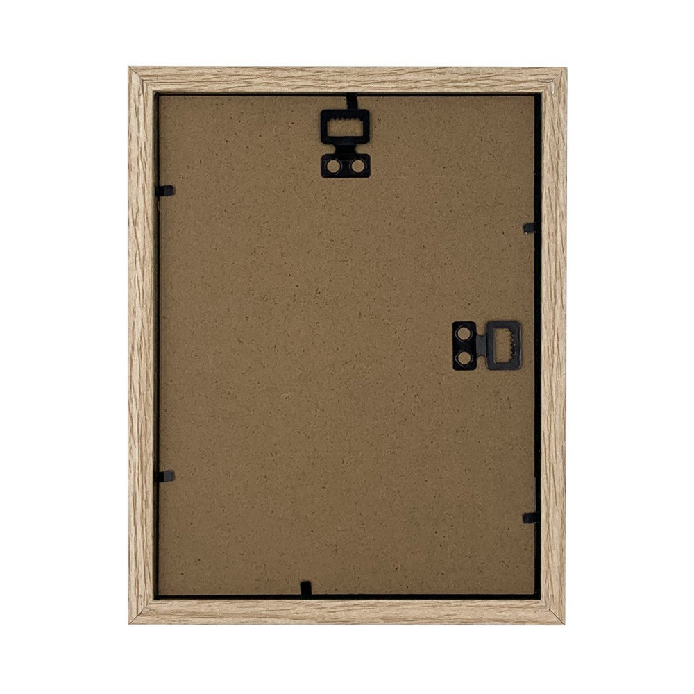 Rear view of a wooden frame showing cork backing board with black metal hanging hardware and corner clips.