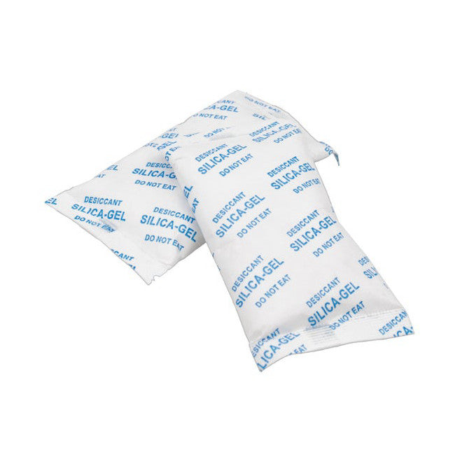 Two white silica gel packets with blue text arranged at an angle against a white background, showing the desiccant product packaging.