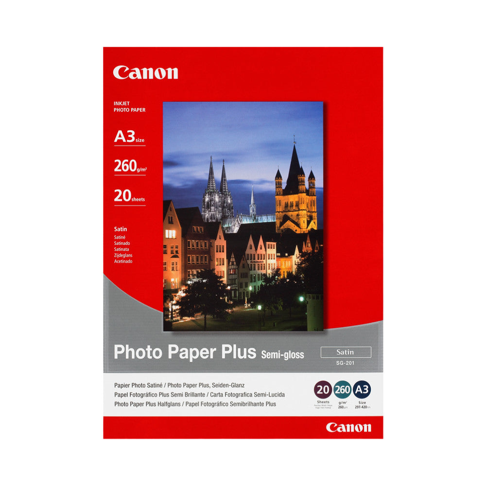 Canon Photo Paper Plus packaging showing a nighttime cityscape photo of illuminated European architecture with churches and buildings.