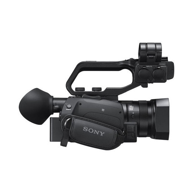 Sony HXR-NX80 camcorder shown from side angle with external microphone and handle mounted on top, against white background.