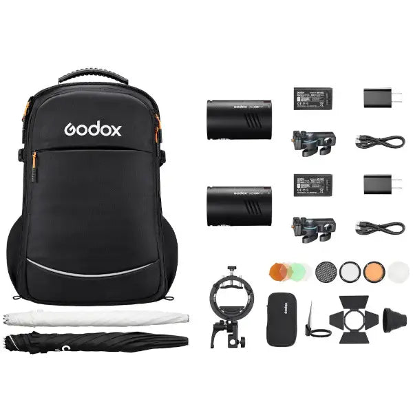 Godox camera backpack with various accessories on a white background